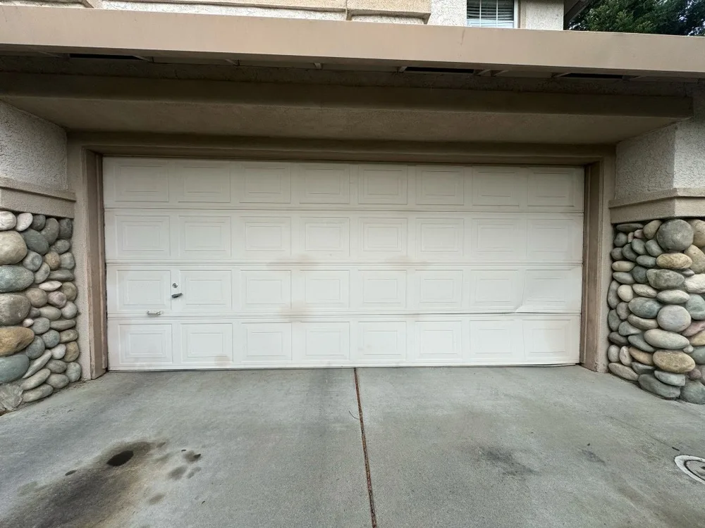 Before: the original door stained, dented and past repair